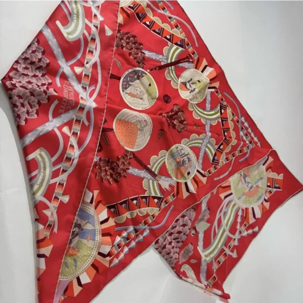 Hermes, silk scarf. The theme is the magic umbrella, coral colorway w/vignettes.